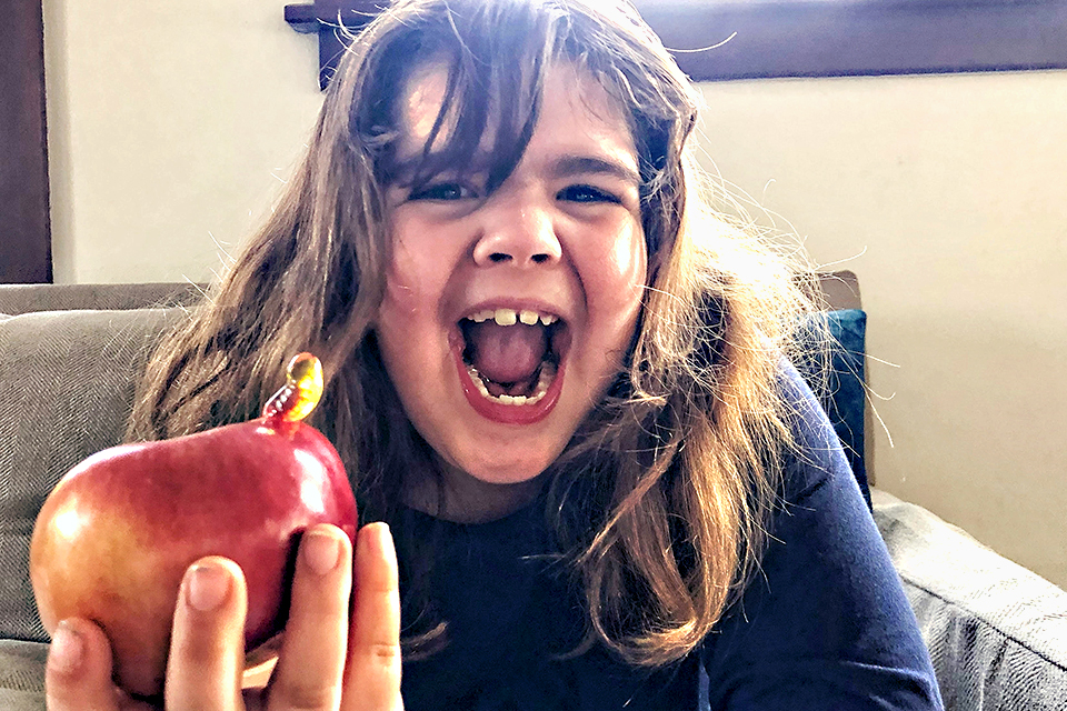 Ewwwww! There's an worm in my apple. Photo by Ally Noel