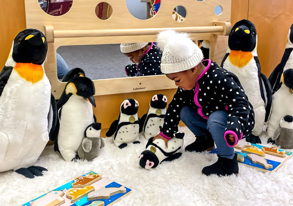 Get out of the cold and find indoor fun, like the Children's Room's Penguin Play Area at Waltham Public Library. Photo courtesy of the library