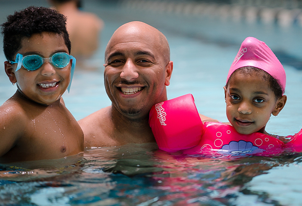 Head out for family fun at the pool when you visit the top indoor swimming pools with day passes in Boston! Photo courtesy of the Greater Boston YMCA