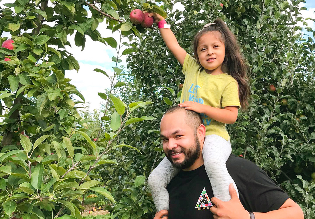 Get the kids in the car (and on your shoulders) for the best apple picking near Boston! Photo courtesy of Connors Farm 
