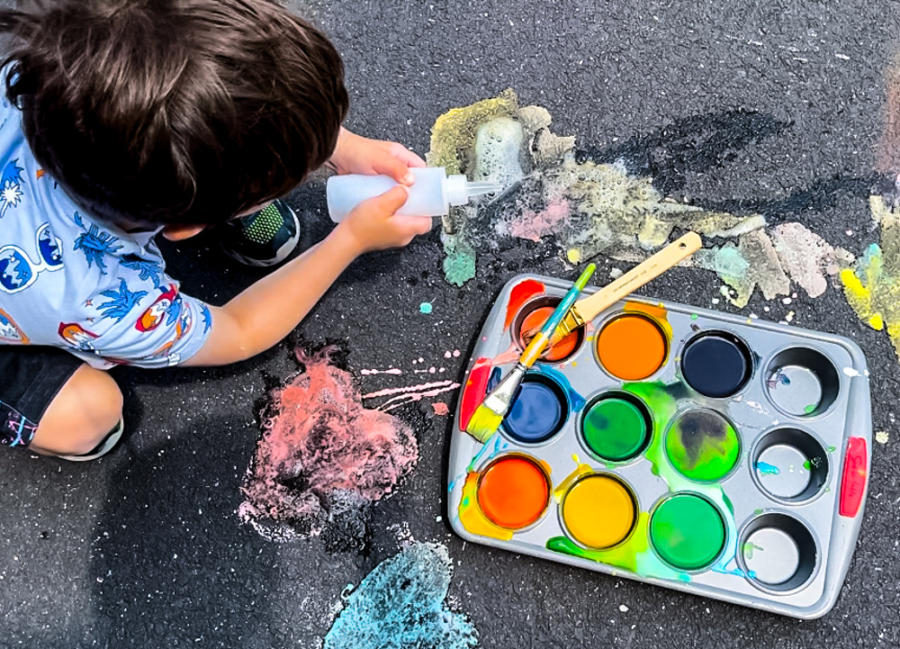 Bring an explosion of color to your driveway with this homemade fizzy sidewalk chalk paint. Photo by author Liz Baill