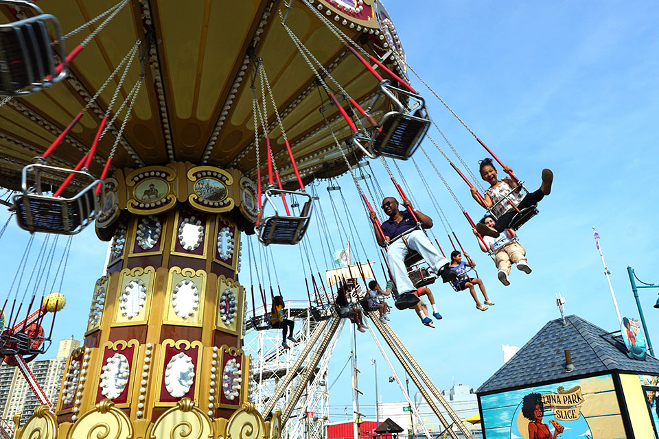 A ride on Lynn's Trapeze puts a smile on the face of visitors young and old. 