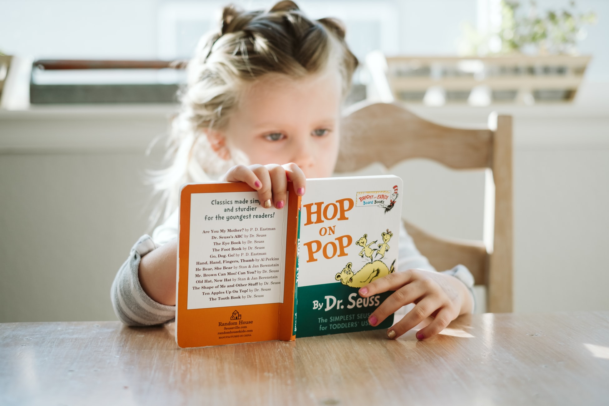 Making time for reading each day is a low-key goal that works for all ages. Photo by Josh Applegate/Unsplash