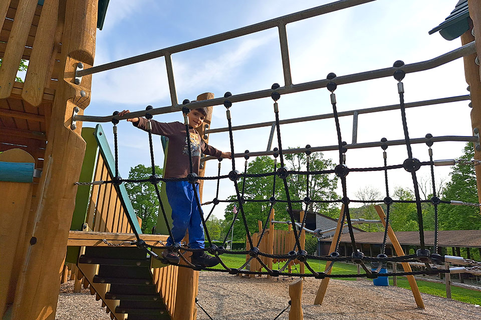 Best Parks and Playgrounds in the Hudson Valley Balance on the wobbly bridge at Freedom Park in Lagrangeville.